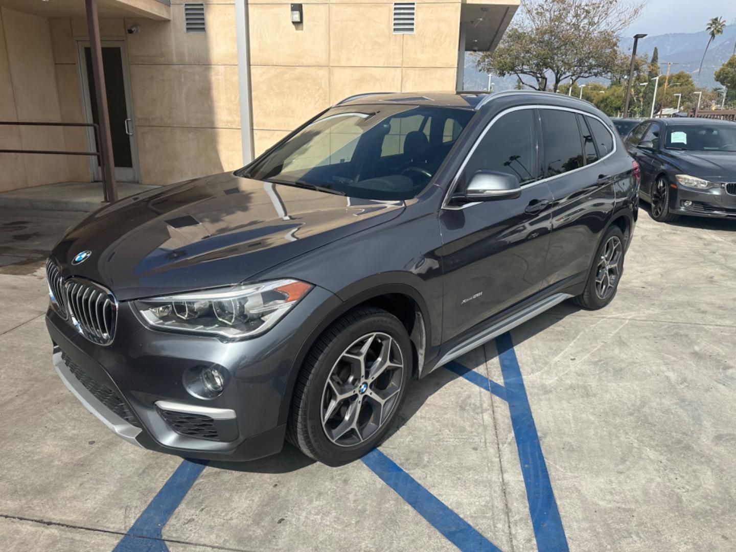 2016 Gray /Black BMW X1 leather (WBXHT3Z34G4) with an 4 CYLINDER engine, Automatic transmission, located at 30 S. Berkeley Avenue, Pasadena, CA, 91107, (626) 248-7567, 34.145447, -118.109398 - Crown City Motors is a used “Buy Here Pay Here” car dealer in Pasadena CA. “Buy Here Pay Here” financing, means that when you purchase your vehicle from our dealership, that you make the payments to the dealership as well. We do not need the banks approval to get you approved for a used auto - Photo#9